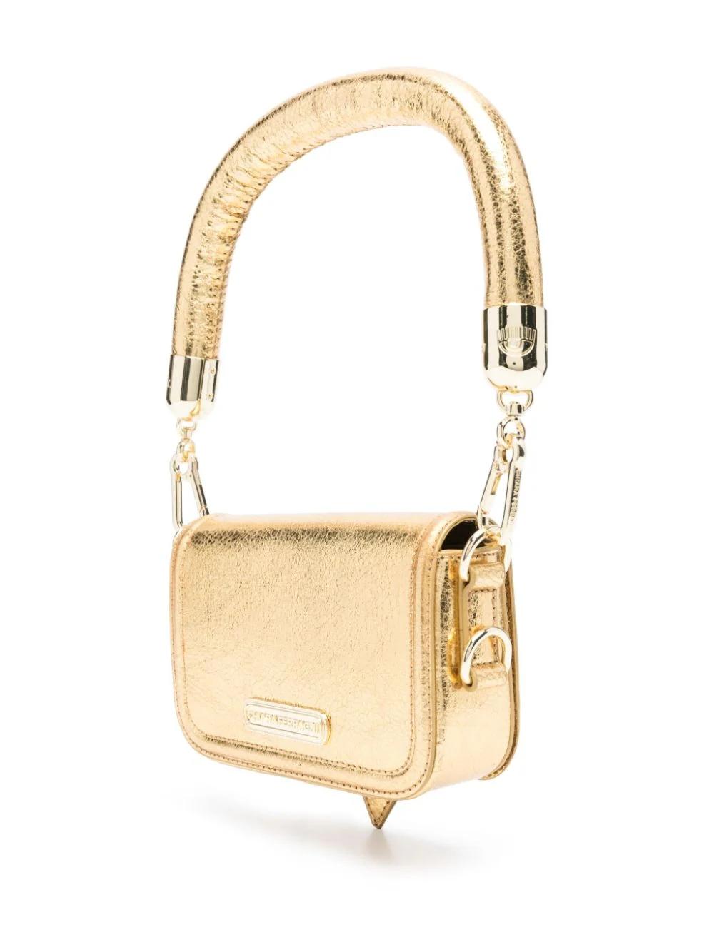 Bolso Chiara Ferragni Eyelike Sketch Dorado